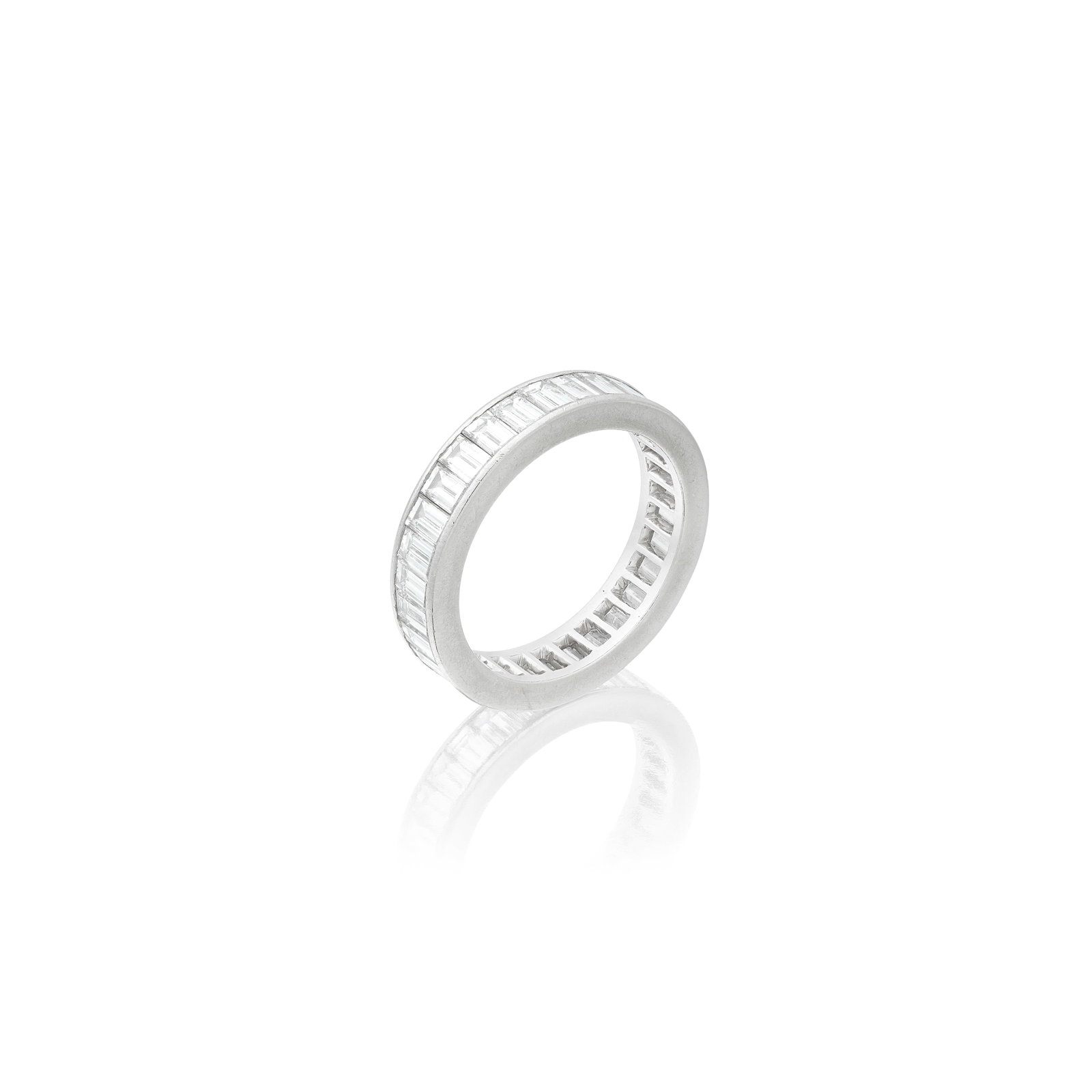 DIAMOND ETERNITY RING: DIAMOND ETERNITY RING Set throughout with baguette-cut diamonds, diamonds approx. 4.20cts total, ring size approx. Q For further information on this lot please visit Bonhams.com