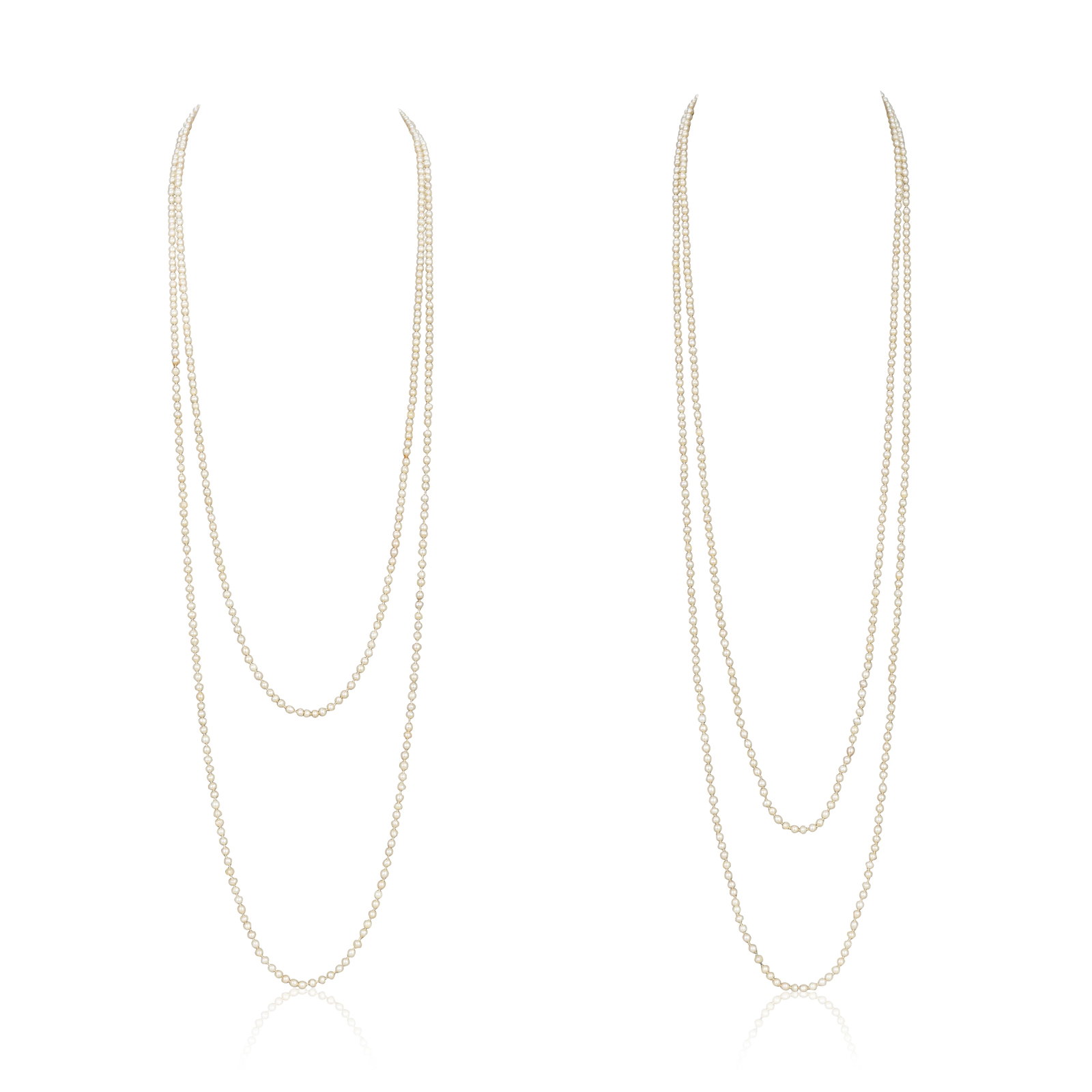 TWO SEED PEARL NECKLACES: TWO SEED PEARL NECKLACES 1st: The single row of seed pearls to an old cushion-cut diamond and emerald three stone clasp, 2nd: the single row of seed pearls to a barrel clasp, lengths 1st: 188.5cm, 2nd