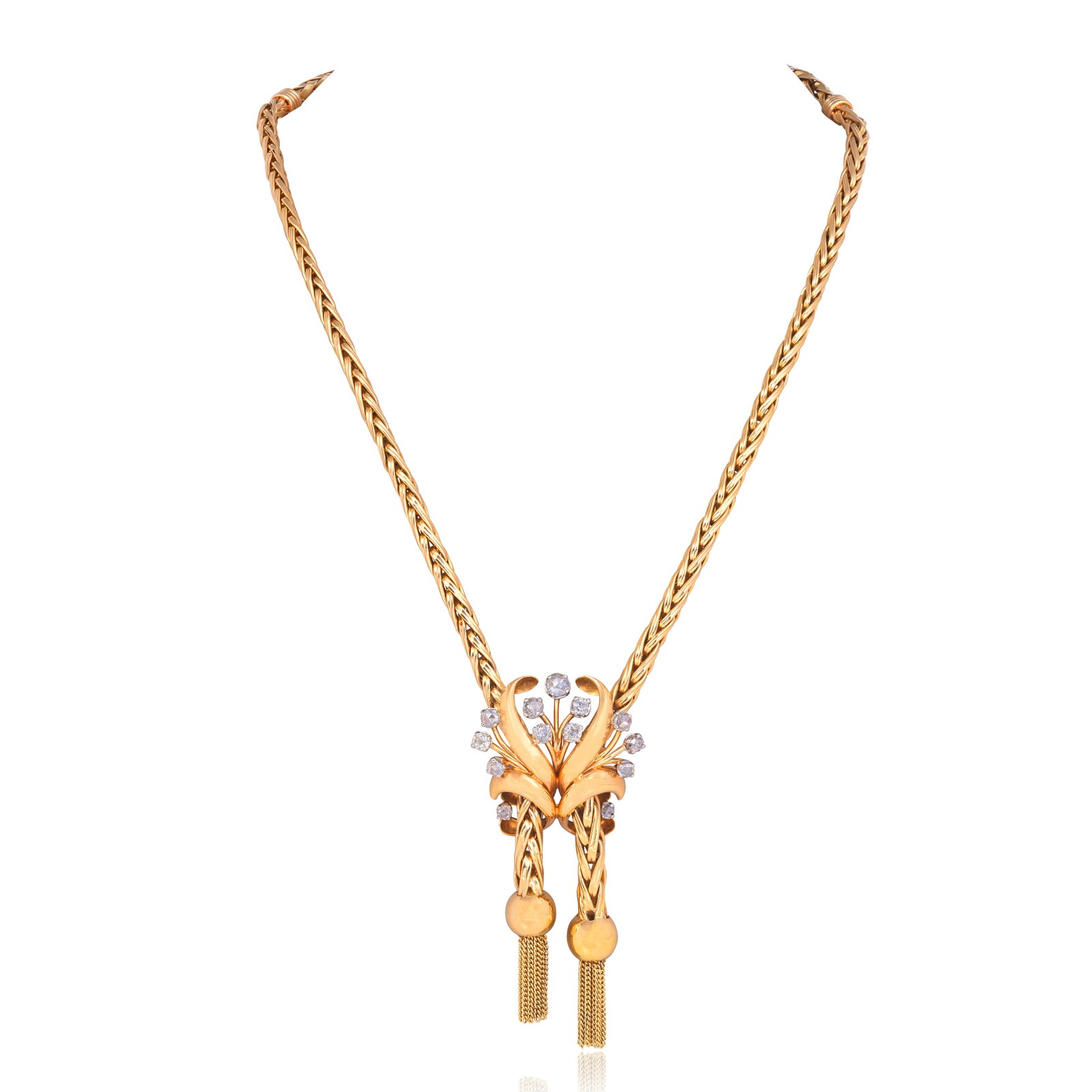 DIAMOND-SET NECKLACE,: DIAMOND-SET NECKLACE, CIRCA 1950 Of fox tail linking, the frontispiece with radiating old cushion and rose-cut diamonds, issuing two tassels, French assay marks, length 50.5cm For further information 