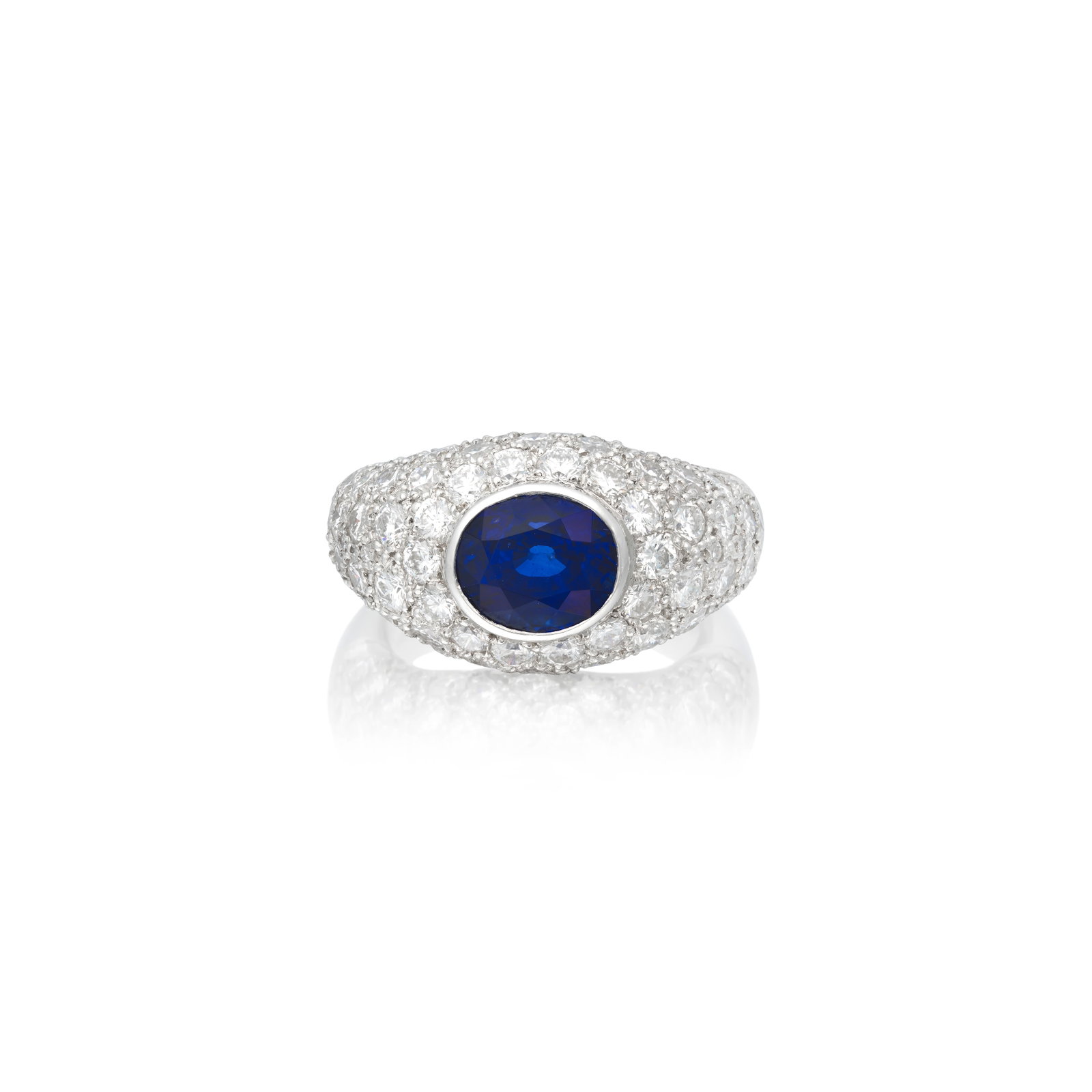 HIRSH: SAPPHIRE AND DIAMOND RING, 2003: HIRSH: SAPPHIRE AND DIAMOND RING, 2003 The bombé style ring set with an oval-cut sapphire to a pavé-set brilliant-cut diamond surround, mounted in platinum, signed Hirsh, maker's mark, Londo