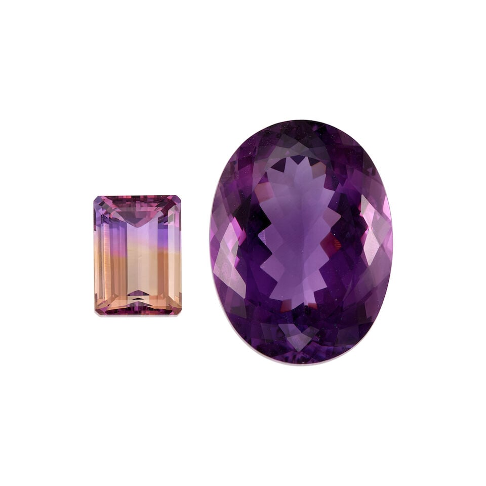 TWO LOOSE GEMSTONES: TWO LOOSE GEMSTONES • One oval shaped amethyst weighing approximately 87.19 carats, measures approximately 34.60mm x 25.90mm x 16.85mm • A rectangular shaped bicolored tourmaline weighing 