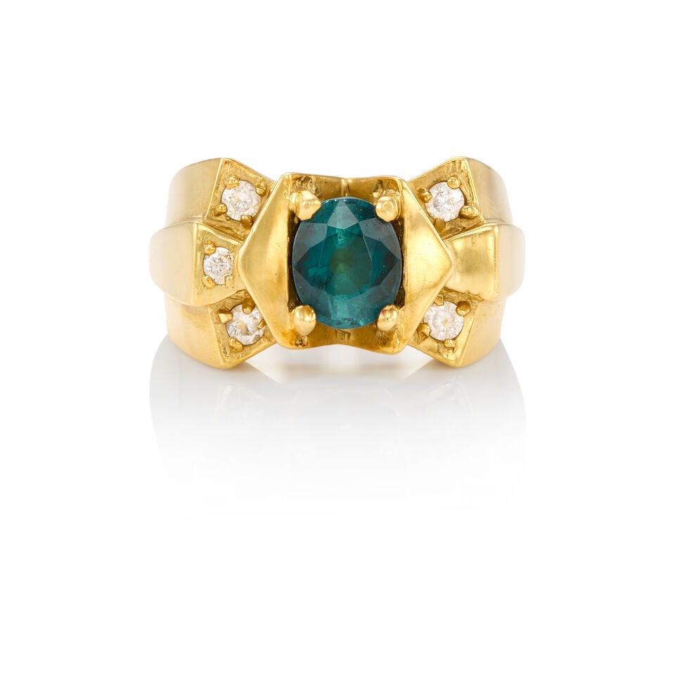 18K YELLOW GOLD, TOURMALINE, AND DIAMOND RING: 18K YELLOW GOLD, TOURMALINE, AND DIAMOND RING • An oval shaped tourmaline weighing approximately 1.40 carats • Four round shaped diamonds weighing approximately 0.16 carat total •