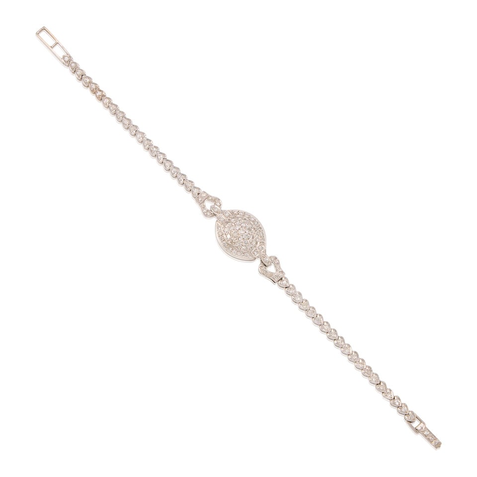 PLATINUM AND DIAMOND BRACELET: PLATINUM AND DIAMOND BRACELET • Numerous round shaped diamonds weighing approximately 1.50 carats total • Length 6 1/2 in. • Estimated gross weight: 13.8 grams Footnotes: OVERALL