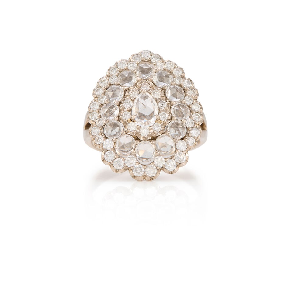 18K WHITE GOLD, MOONSTONE AND DIAMOND RING: 18K WHITE GOLD, MOONSTONE AND DIAMOND RING • One pear shaped and numerous round shaped moonstones • Numerous round brilliant diamonds • Size 6 1/4 • Estimated gross weight: 7.1