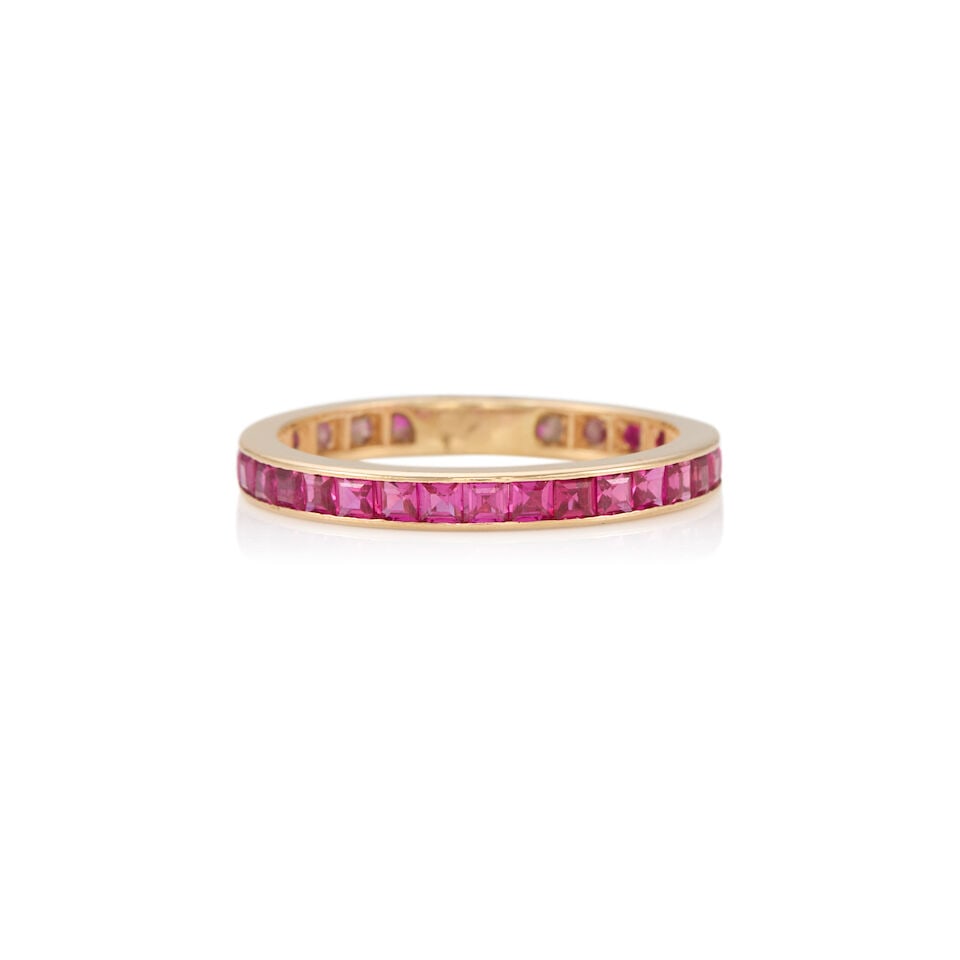 14K YELLOW GOLD AND SYNTHETIC RUBY RING: 14K YELLOW GOLD AND SYNTHETIC RUBY RING • Numerous square shaped synthetic rubies measuring approximately 1.82mm in width • Size 8 1/2 • Estimated gross weight: 2.3