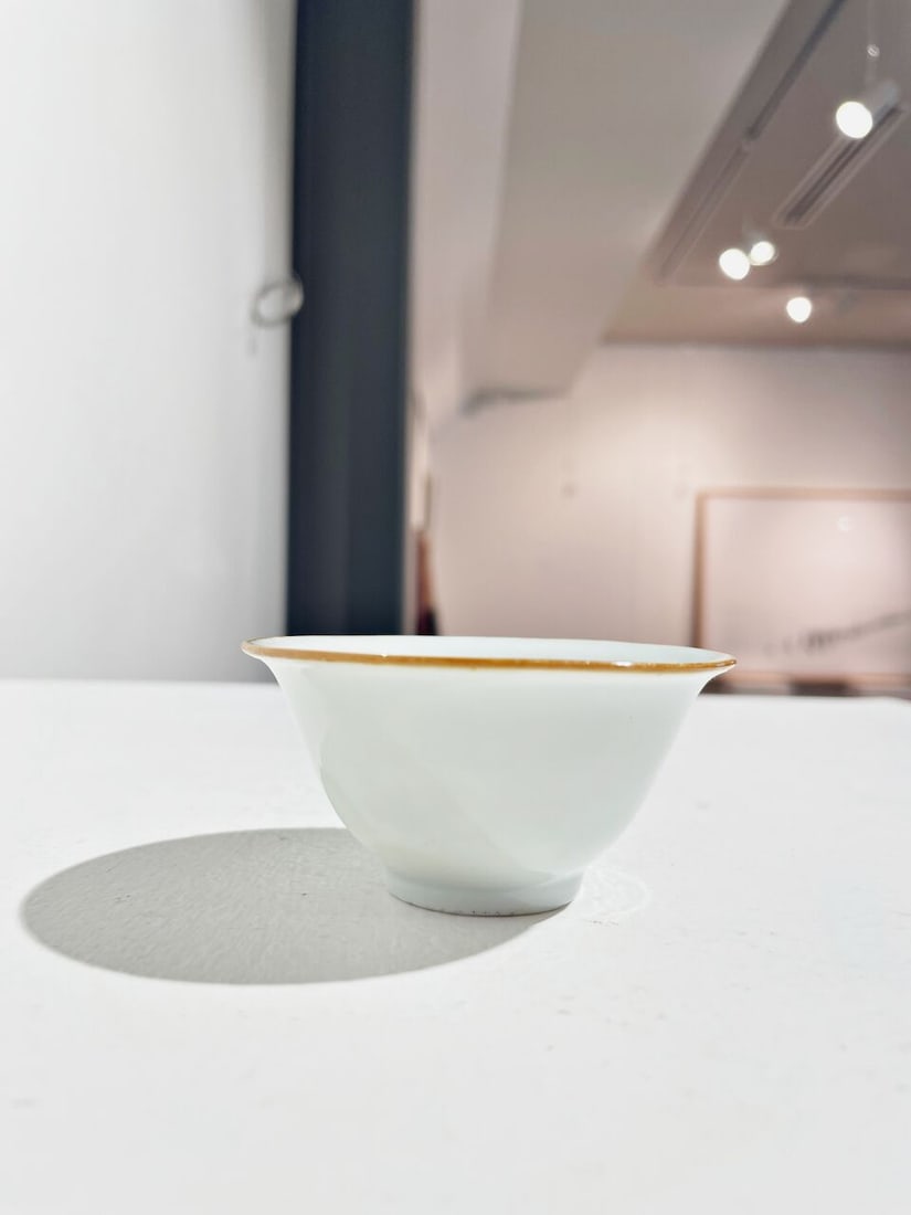 A WHITE-GLAZED MOULDED 'DRAGON AND CARP' CUP Transitional Period - 9
