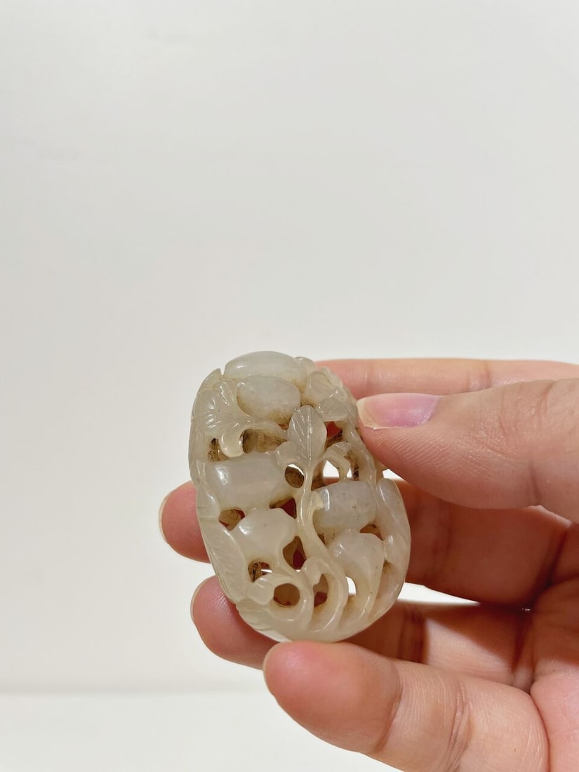 A RETICULATED 'GOURD' PENDANT - 2