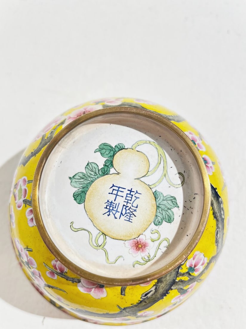 A PAINTED ENAMEL 'PLUM BLOSSOM' BOWL AND COVER Qianlong four-character mark, 20th century - 2