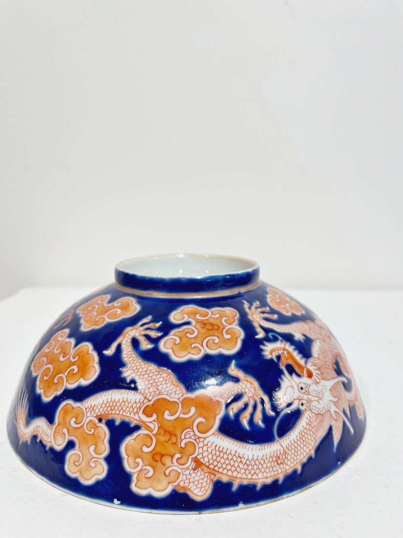 A BLUE GROUND IRON-RED ENAMELLED 'DRAGON' BOWL Daoguang six-character mark, 19th century - 2