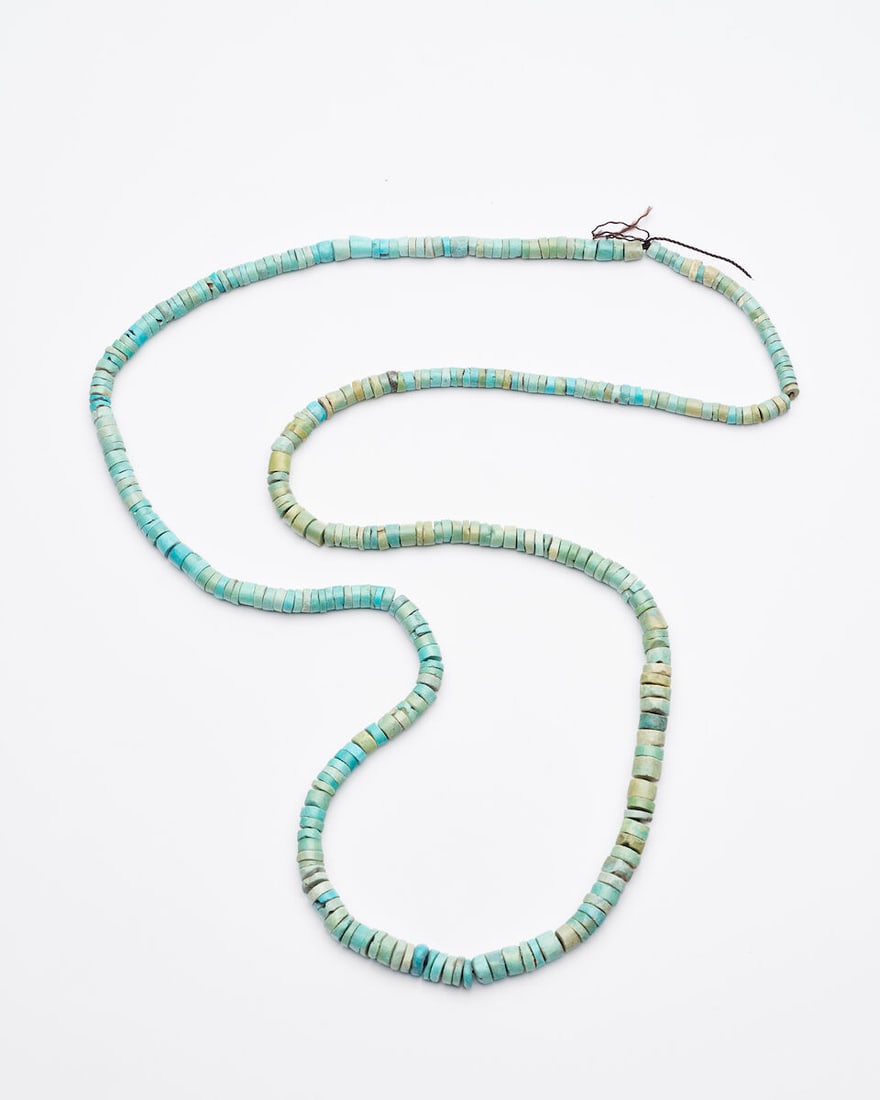 A TURQUOISE BEADED NECKLACE Warring States or later: A TURQUOISE BEADED NECKLACE Warring States or later 40.6cm long Footnotes: 戰國或以後 綠松石串珠鏈 Compare with a similar group, see C