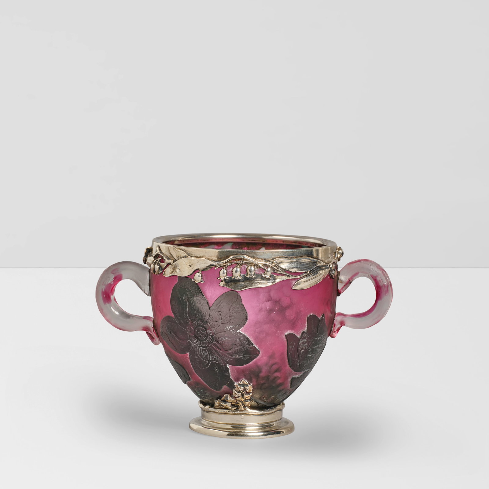 DAUM (FOUNDED 1825) Handled Cupcirca 1900martelé glass, sterling silver, etched 'Daum Nanc...: DAUM (FOUNDED 1825) Handled Cup circa 1900 martelé glass, sterling silver, etched 'Daum Nancy' with Cross of Lorraine height 4in (10.1cm); width 6in (15.3cm); depth 4in (10.1cm) For further infor