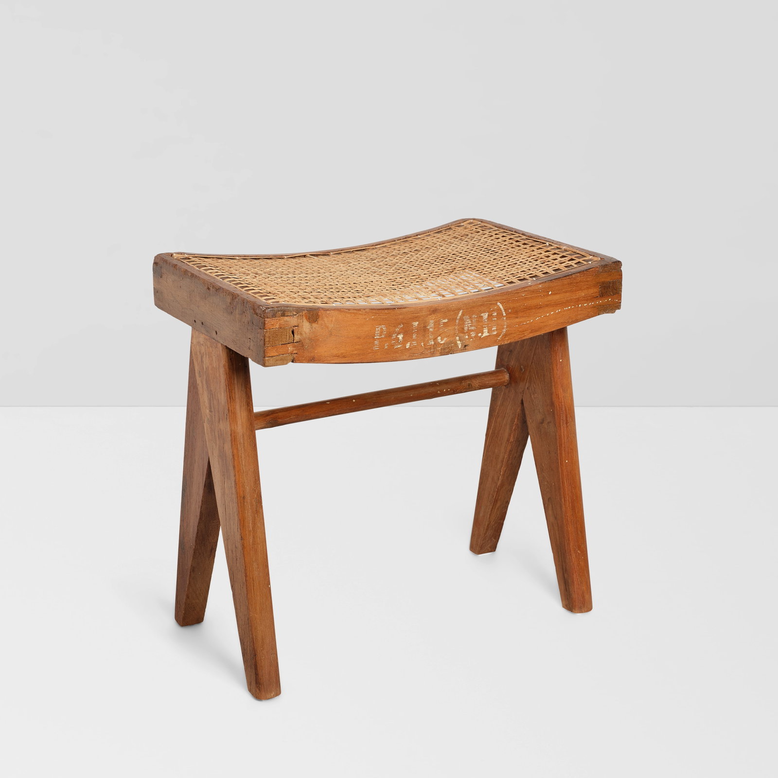 PIERRE JEANNERET (1896-1967) Chandigarh Stoolcirca 1960teak, cane, numbered 'P.G.I.15 (N.H)' alo... (1 of 1)