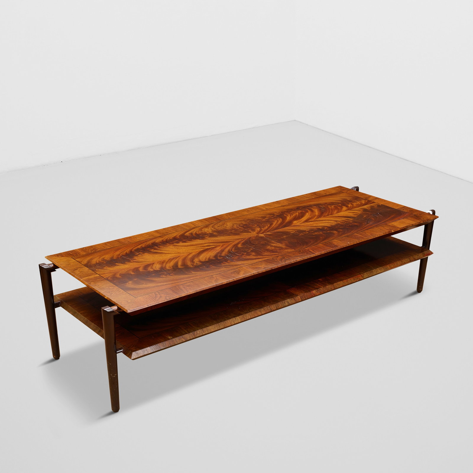 WILLIAM HAINES (1900-1973) Two-Tier Coffee Tablestained and polished mahoganyheight 20 1/4in (51... (1 of 1)