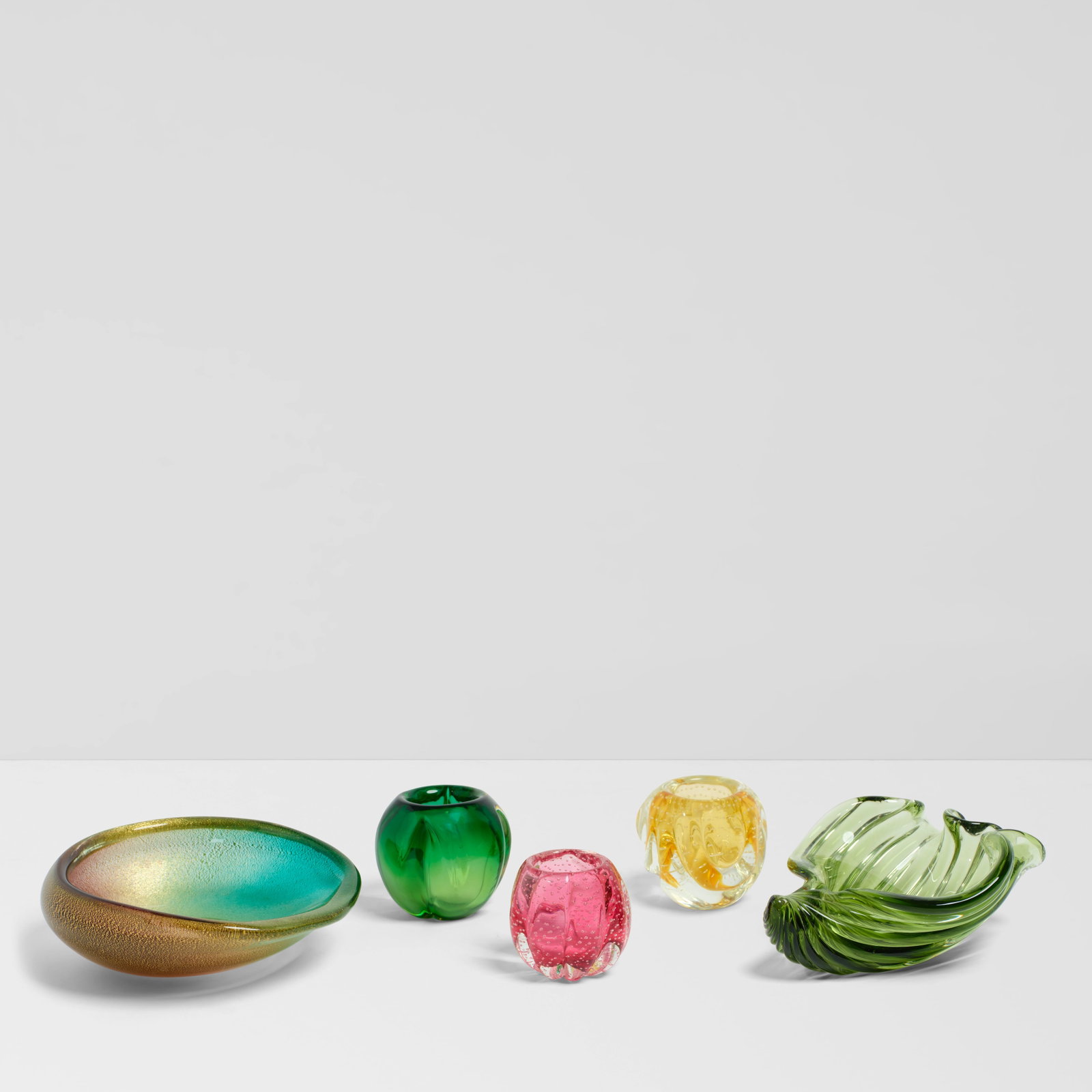 A GROUP OF FIVE MURANO BLOWN GLASS BOWLS OWNED BY WILLIAM HAINES 20th centuryheight of largest 2...: A GROUP OF FIVE MURANO BLOWN GLASS BOWLS OWNED BY WILLIAM HAINES 20th century height of largest 2 3/4in (7cm); widest width 8in (20.3cm) Footnotes: Provenance Billy Haines, Lorna Lane Residence, Brent
