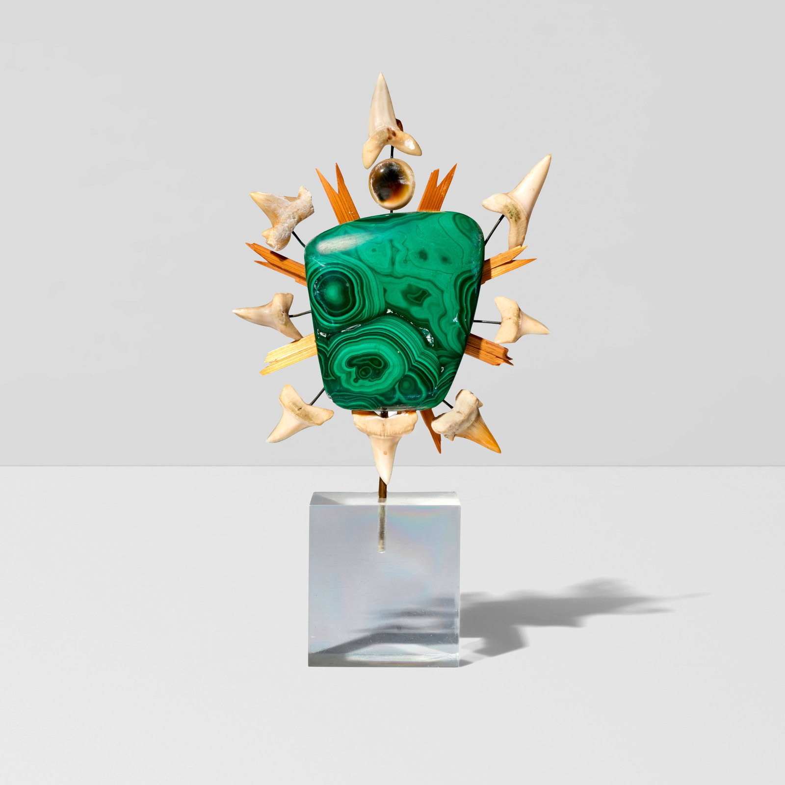 TONY DUQUETTE (1914-1999) Small Totemcirca 1985malachite, shark teeth, shell, Lucite base, wire,... (1 of 1)