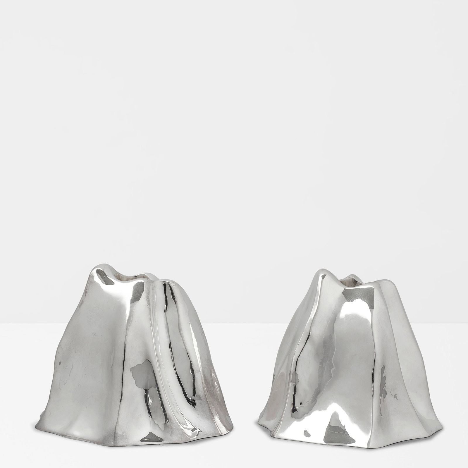 GEORG JENSEN (ESTABLISHED 1904) Pair of Volcano Candlesticks1983designed by Ole Kortzau, sterlin... (1 of 1)