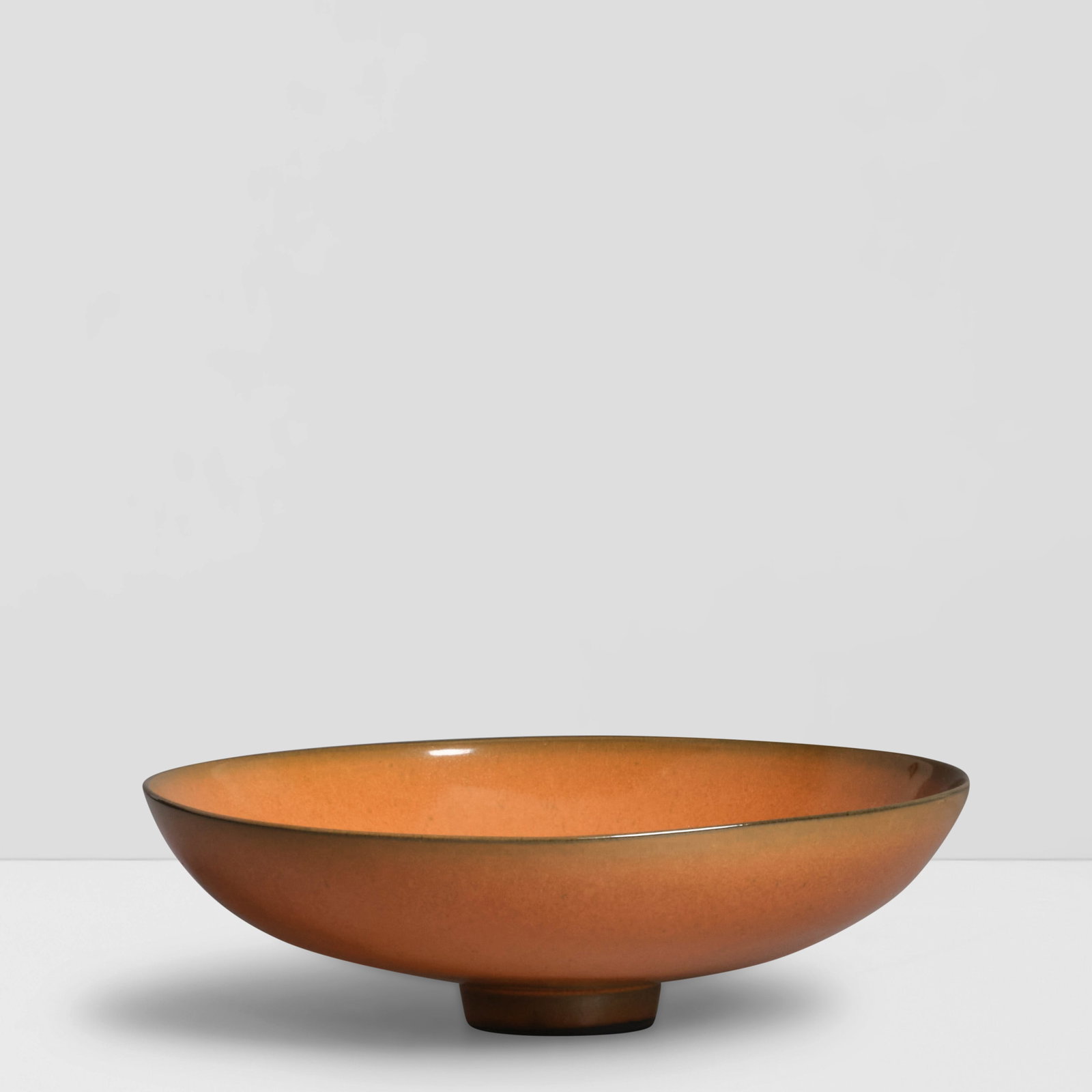 JAMES LOVERA (1920-2015) Footed Bowlglazed earthenware, incised 'lovera' on underside height 2 3...: JAMES LOVERA (1920-2015) Footed Bowl glazed earthenware, incised 'lovera' on underside height 2 3/4in (7cm); diameter 8 1/4in (21cm) This lot is subject to the following lot symbols: ¤ ¤ Unl