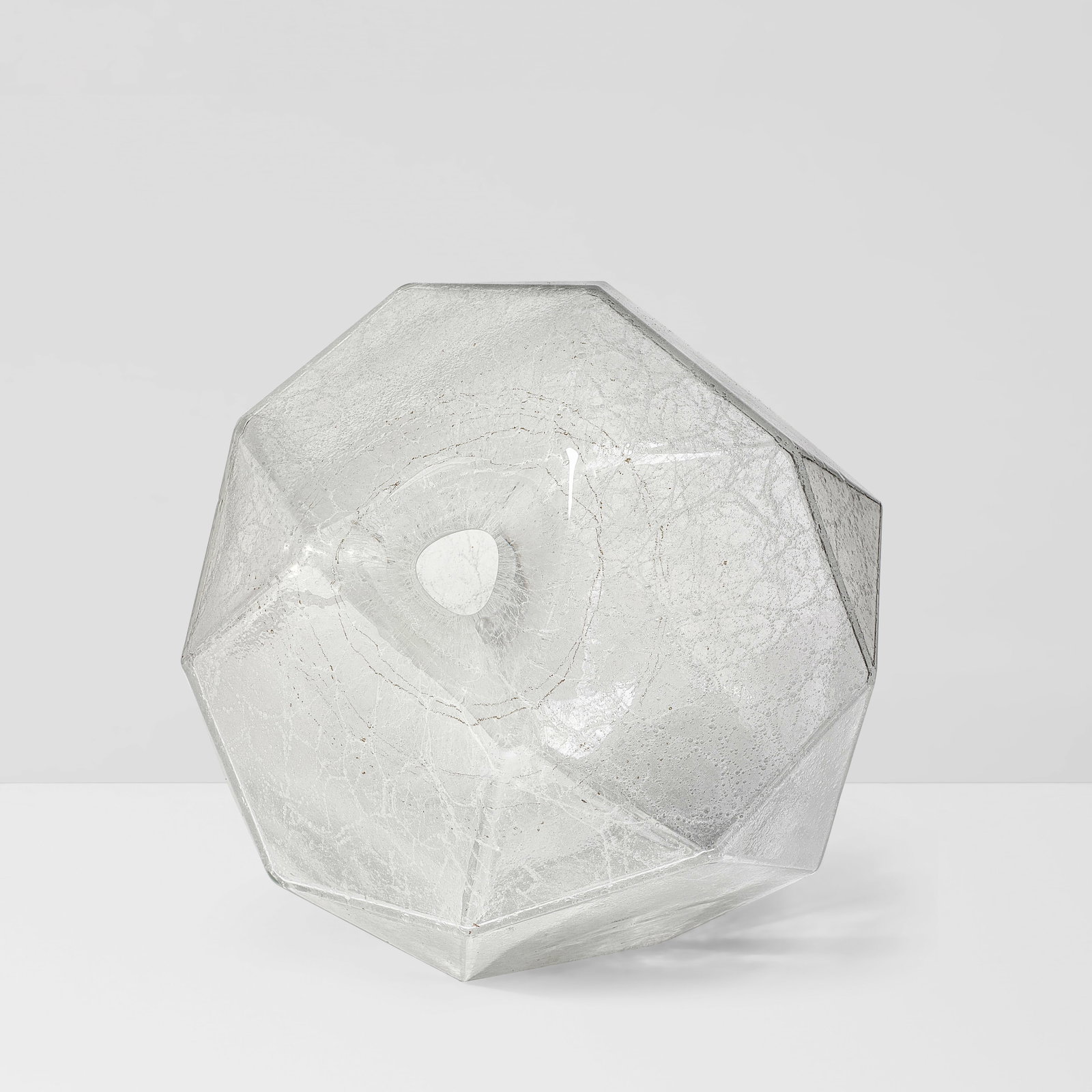 JOHN TORREANO (BORN 1941) Polyhedral Vessel2012mold-blown glass, etched 'Torreano 2012' on under...: JOHN TORREANO (BORN 1941) Polyhedral Vessel 2012 mold-blown glass, etched 'Torreano 2012' on underside height 14in (36cm); width 14in (36cm); depth 14in (36cm) Footnotes: John Torreano, a painter work
