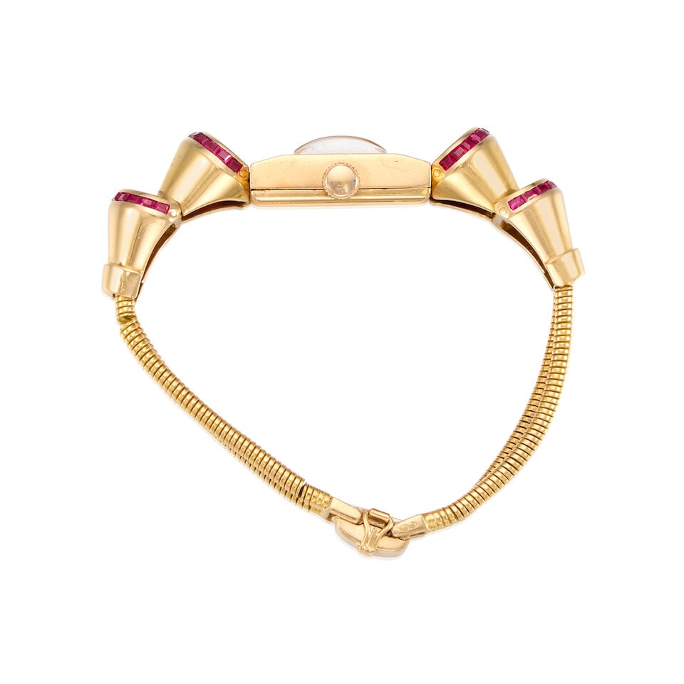AN 18K ROSE GOLD AND RUBY WATCH, FRENCH, CIRCA 1940 - 2
