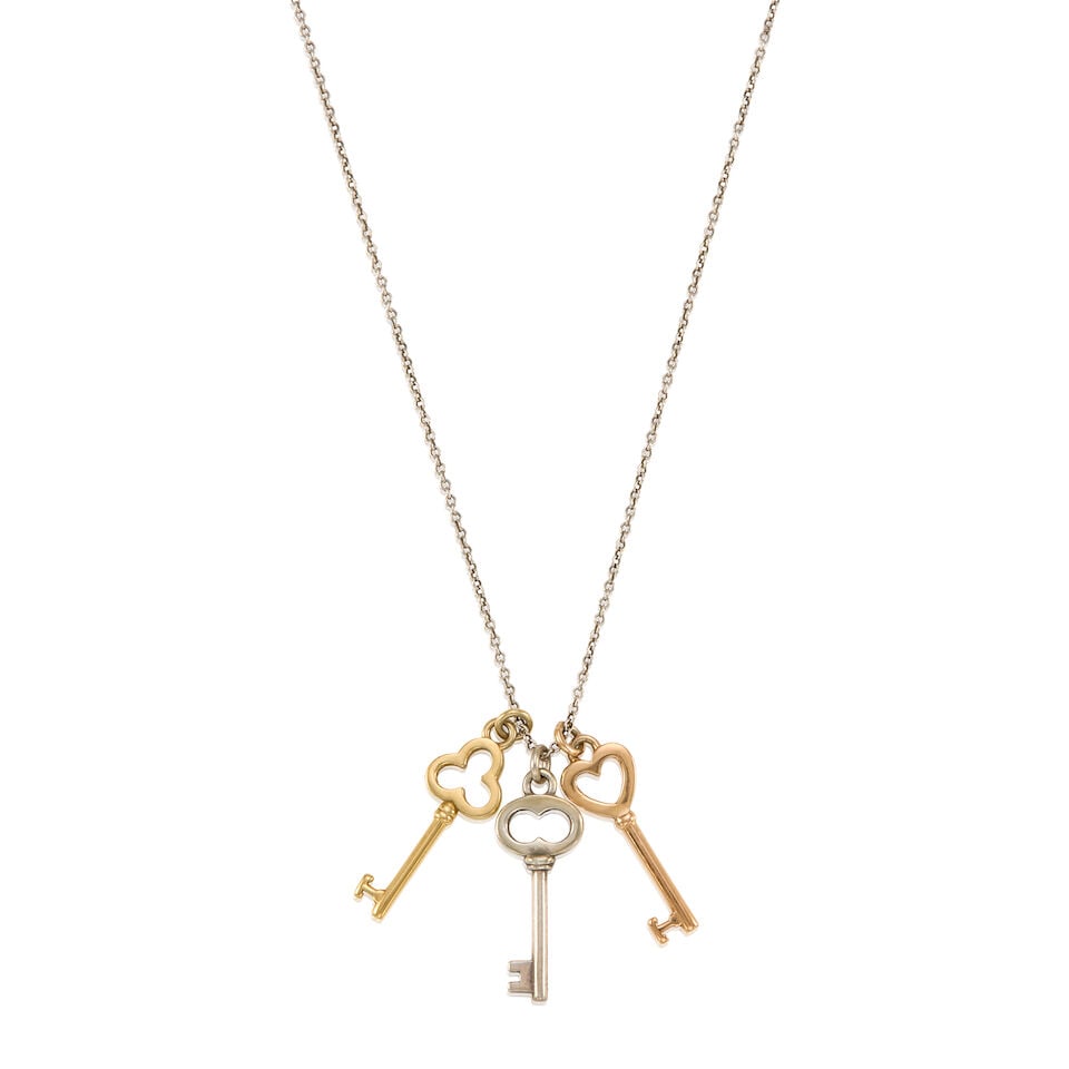 TIFFANY & CO.: A STERLING SILVER AND GOLD CHAIN WITH GOLD CHARM PENDANTS - 2