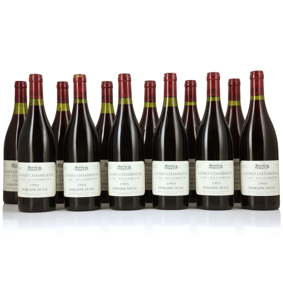Domaine Dujac, Gevrey-Chambertin 1er Cru Aux Combottes, 1993 (12 x 750ml): Domaine Dujac, Gevrey-Chambertin 1er Cru Aux Combottes, 1993 (12 x 750ml) Region: Côte de Nuits Fill Level: 1 x 3cm Capsule: 5 corroded, 3 lightly Label: bin-soiled & damp-affected Packaging: ori