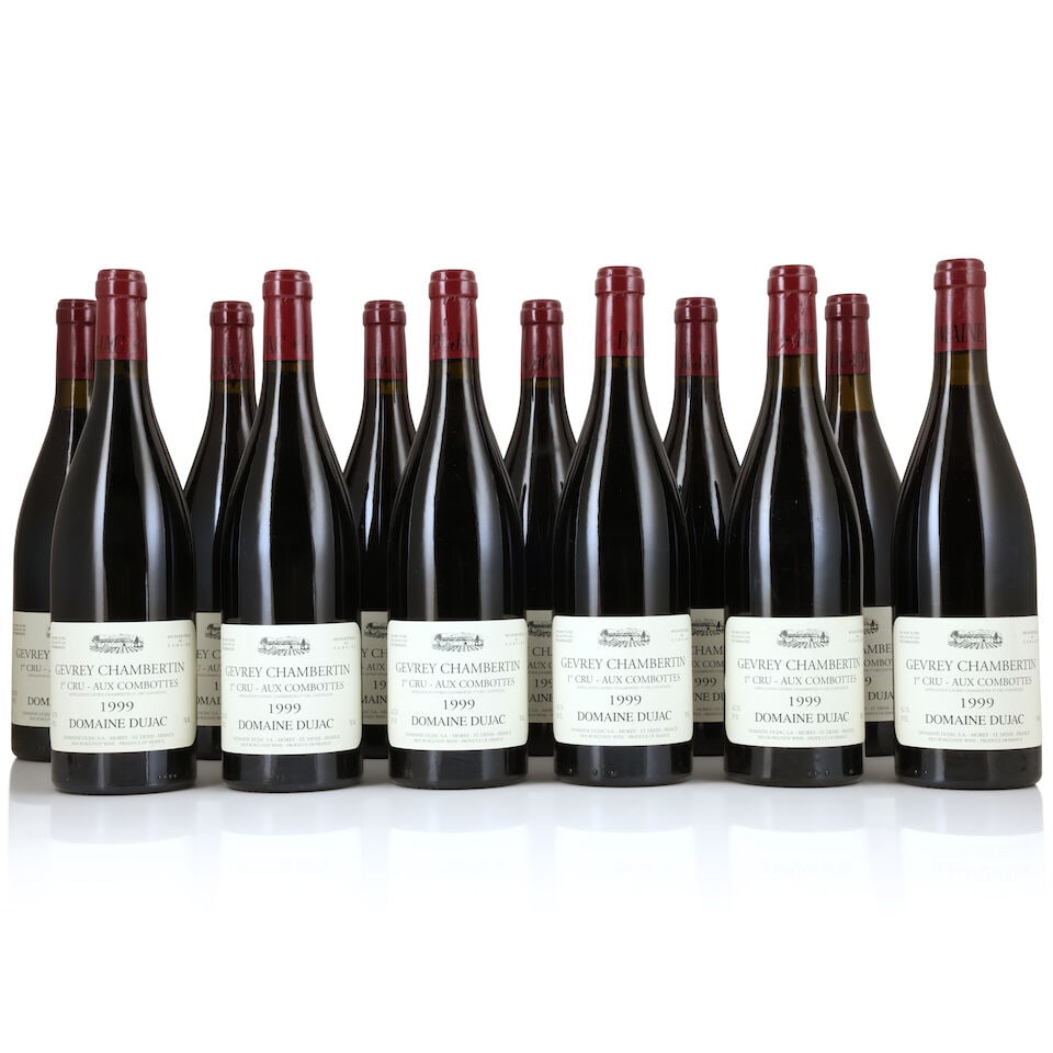 Domaine Dujac, Gevrey-Chambertin 1er Cru Aux Combottes, 1999 (12 x 750ml): Domaine Dujac, Gevrey-Chambertin 1er Cru Aux Combottes, 1999 (12 x 750ml) Region: Côte de Nuits Label: lightly bin-soiled Packaging: original carton (lightly damp-affected) For further informatio