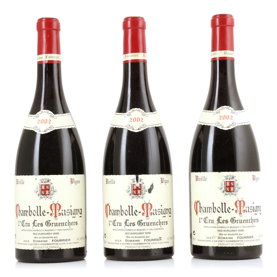 Domaine Fourrier, Chambolle-Musigny 1er Cru Les Gruenchers, 2002 (3 x 750ml): Domaine Fourrier, Chambolle-Musigny 1er Cru Les Gruenchers, 2002 (3 x 750ml) Region: Côte de Nuits Label: bin-soiled & nicked - 1 scuffed For further information on this lot please visit Bonhams.