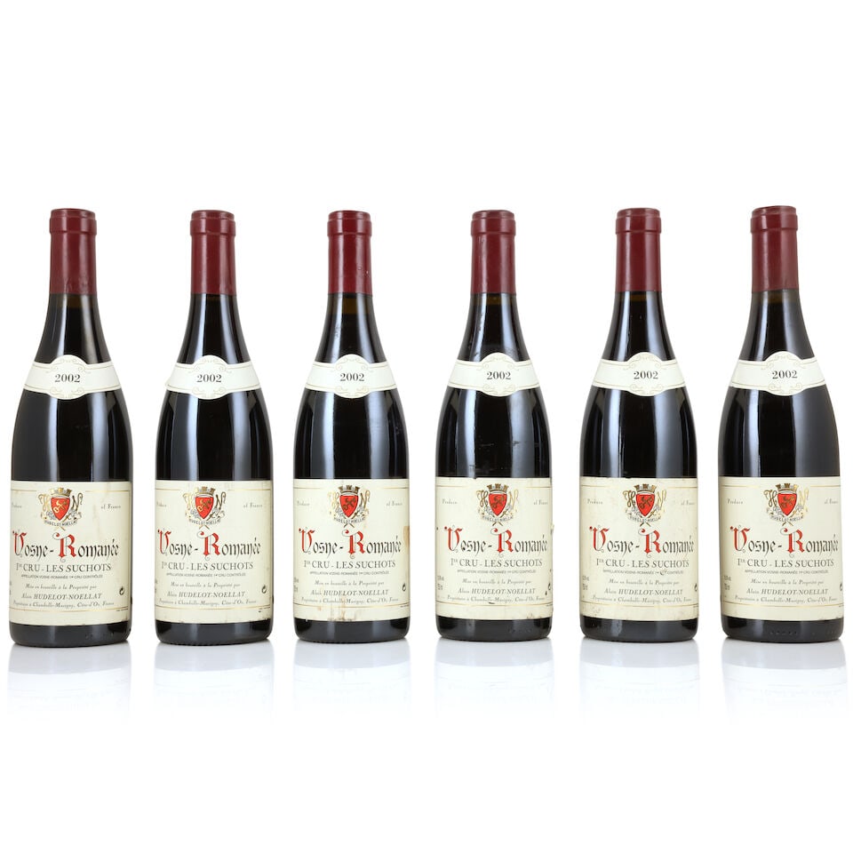 Domaine Hudelot-Noëllat, Vosne-Romanée 1er Cru Les Suchots, 2002 (6 x 750ml): Domaine Hudelot-Noëllat, Vosne-Romanée 1er Cru Les Suchots, 2002 (6 x 750ml) Region: Côte de Nuits Capsule: 1 lightly corroded Label: bin-soiled, damp-stained & scuffed For further info