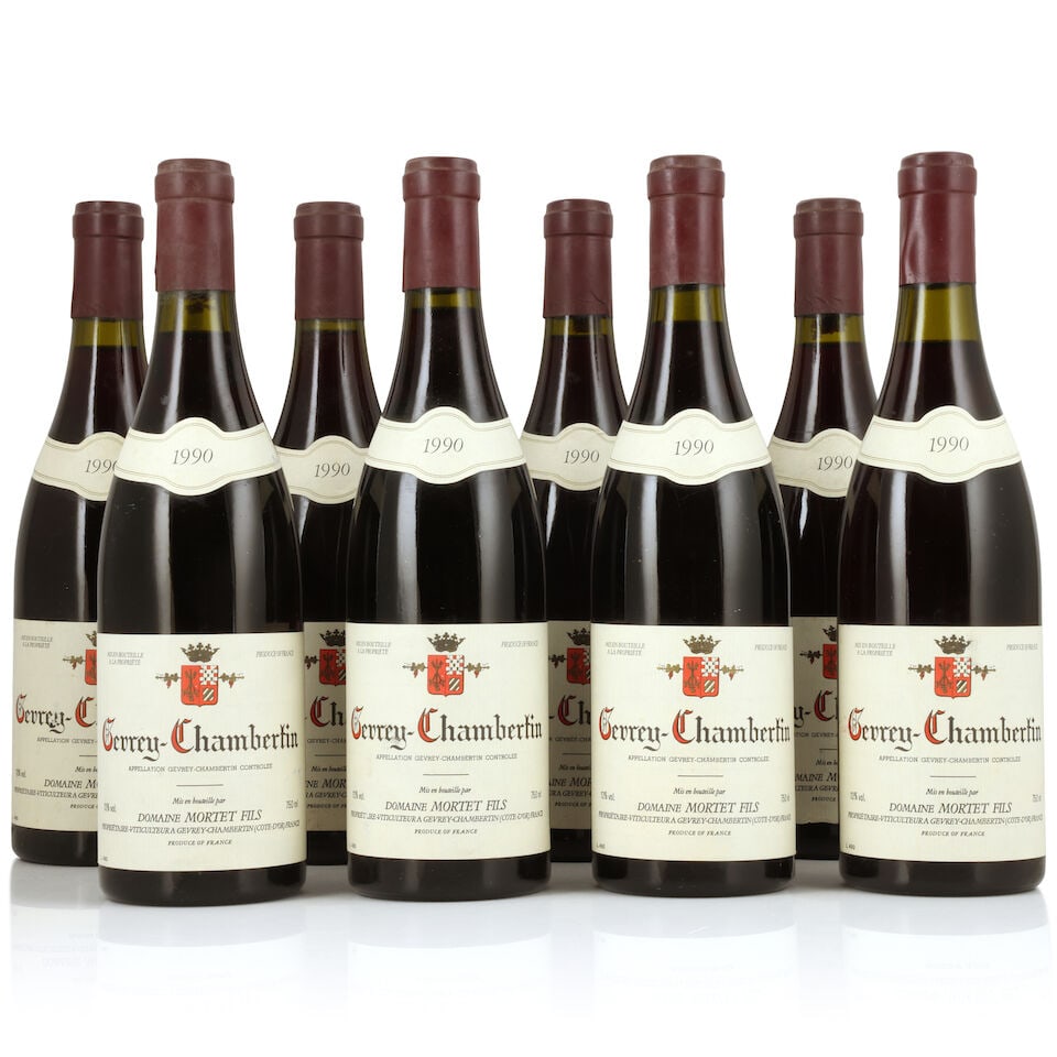 Domaine Mortet, Gevrey-Chambertin, 1990 (8 x 750ml): Domaine Mortet, Gevrey-Chambertin, 1990 (8 x 750ml) Region: Côte de Nuits Capsule: slightly worn Label: bin-soiled & damp-stained, 6 lightly For further information on this lot please visit Bonha
