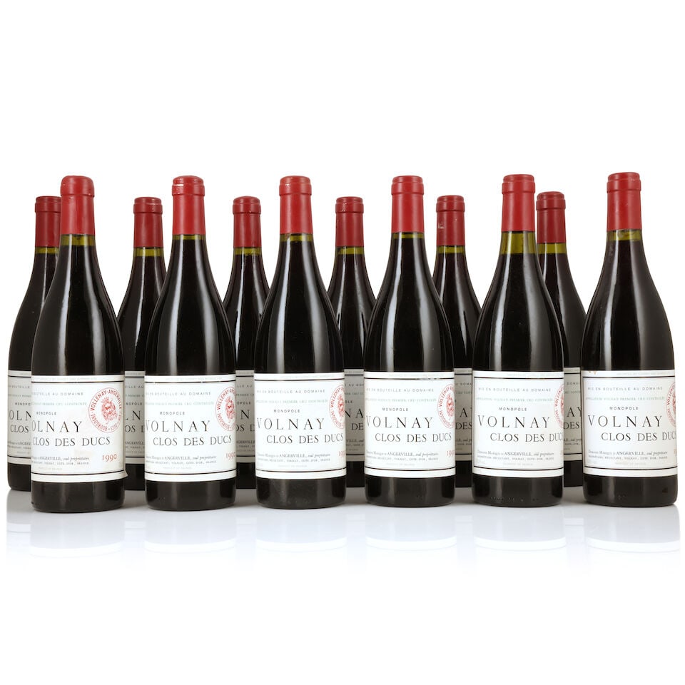 Domaine Marquis d'Angerville, Volnay 1er Cru Clos des Ducs, 1990 (12 x 750ml): Domaine Marquis d'Angerville, Volnay 1er Cru Clos des Ducs, 1990 (12 x 750ml) Region: Côte de Beaune Capsule: slightly corroded Label: lightly bin-soiled & damp-affected For further information o