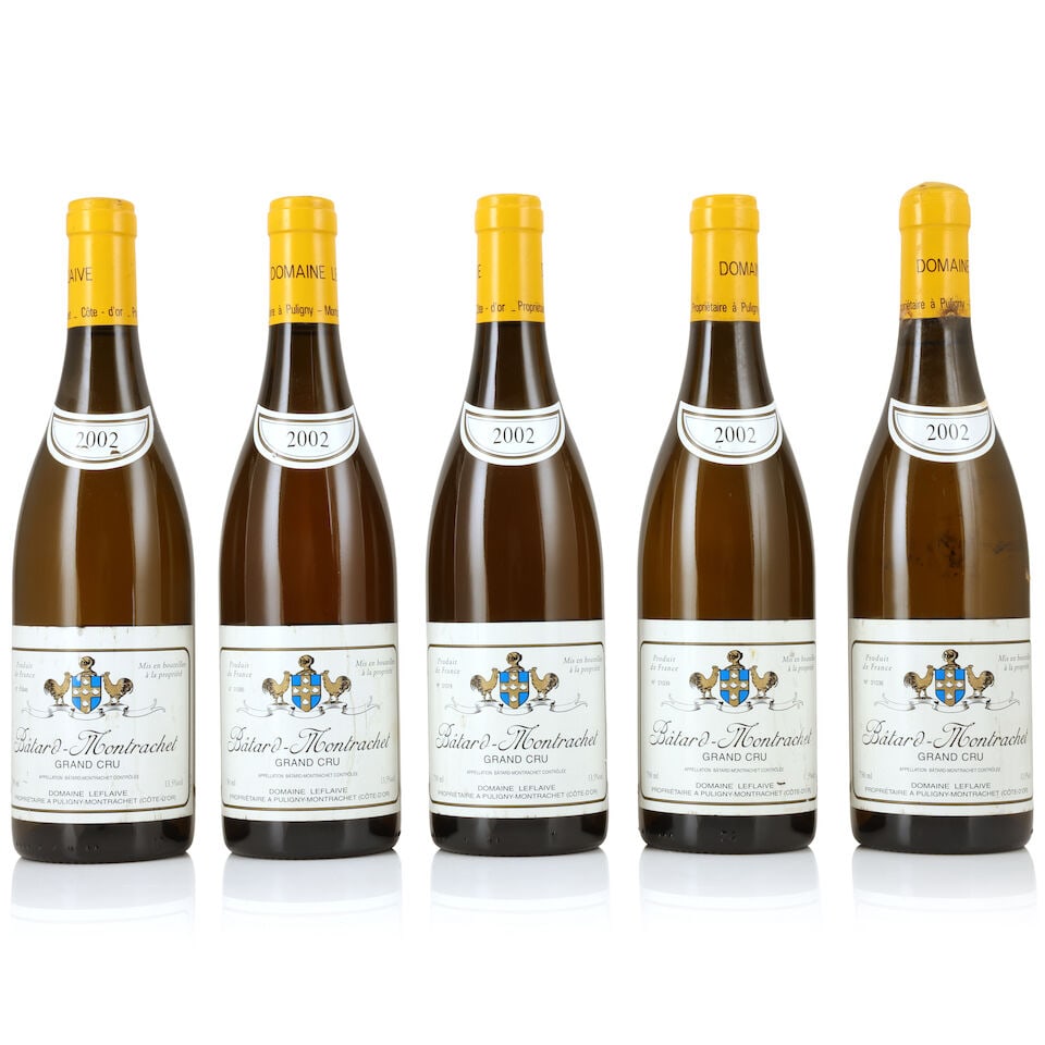 Domaine Leflaive, Bâtard-Montrachet, 2002 (5 x 750ml): Domaine Leflaive, Bâtard-Montrachet, 2002 (5 x 750ml) Region: Côte de Beaune Capsule: 3 corroded, 2 lightly; 1 expanded with signs of old seepage Label: bin-soiled & worn, 3 marked, 1 slight