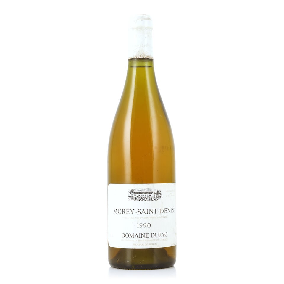 Domaine Dujac, Morey-Saint-Denis Blanc, 1990 (1 x 750ml): Domaine Dujac, Morey-Saint-Denis Blanc, 1990 (1 x 750ml) Region: Côte de Nuits Capsule: bin-soiled & slightly worn Label: bin-soiled & nicked For further information on this lot please visit Bonh