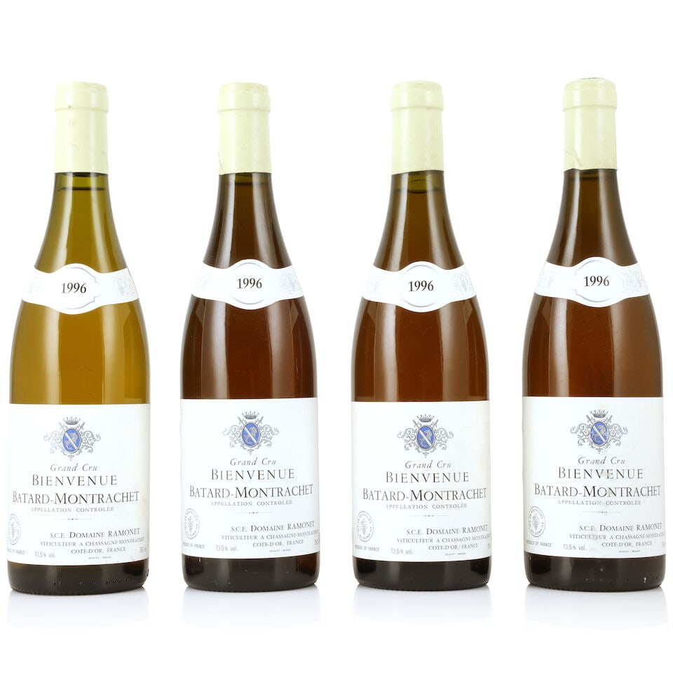 Domaine Ramonet, Bienvenues Bâtard-Montrachet, 1996 (4 x 750ml): Domaine Ramonet, Bienvenues Bâtard-Montrachet, 1996 (4 x 750ml) Region: Côte de Beaune Capsule: slightly worn Label: bin-soiled, damp-affected & nicked Miscellaneous: significant colour vari