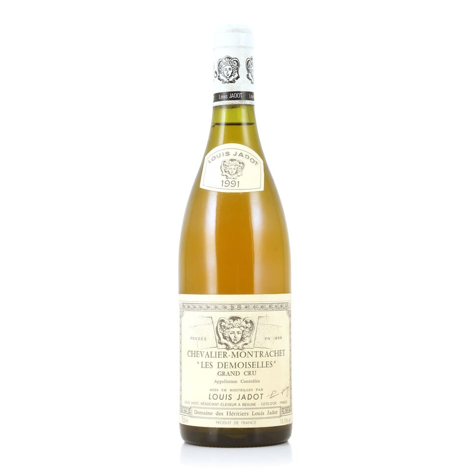 Domaine des Héritiers, Louis Jadot, Chevalier-Montrachet Les Demoiselles, 1991 (1 x 750ml): Domaine des Héritiers, Louis Jadot, Chevalier-Montrachet Les Demoiselles, 1991 (1 x 750ml) Region: Côte de Beaune Capsule: slightly worn Label: lightly bin-soiled & damp-affected For further