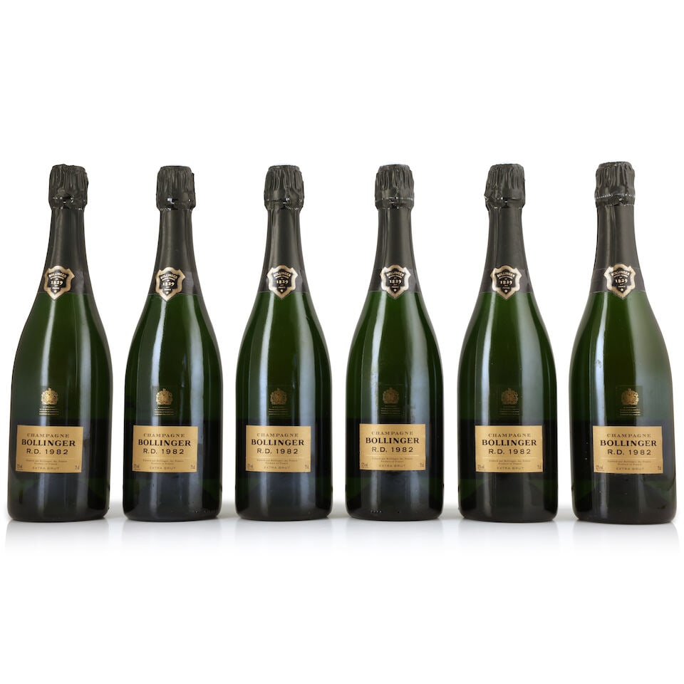 Bollinger, R.D., 1982 (6 x 750ml): Bollinger, R.D., 1982 (6 x 750ml) Region: Champagne Capsule: 3 lightly corroded foils Label: lightly damp-affected - 1 nicked Packaging: individual wooden presentation cases in 2 x original cartons (d