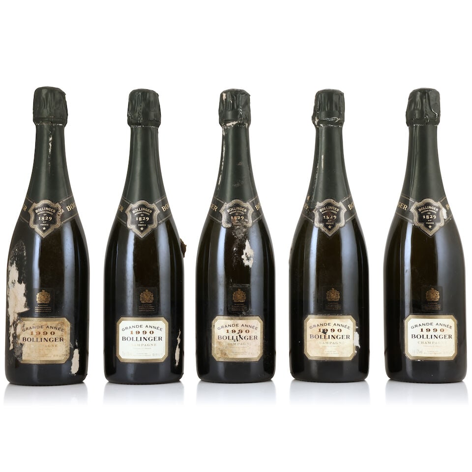 Bollinger, La Grande Année, 1990 (5 x 750ml): Bollinger, La Grande Année, 1990 (5 x 750ml) Region: Champagne Capsule: bin-soiled & worn foils Label: bin-soiled, damp-stained & worn labels - 3 badly - 3 nicked, 1 torn & incomplete For further