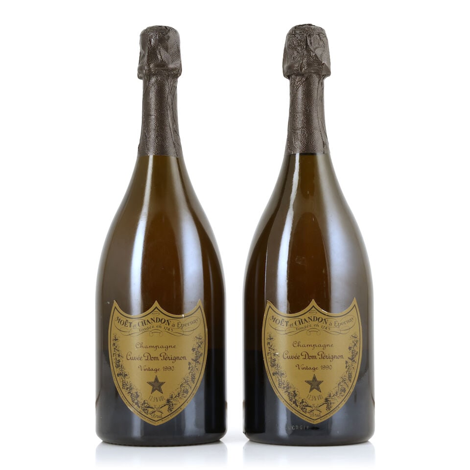 Dom Pérignon, 1990 (2 x 750ml): Dom Pérignon, 1990 (2 x 750ml) Region: Champagne Label: nicked & slightly peeling Packaging: individual presentation cases (damp-affected) For further information on this lot please visit Bonhams