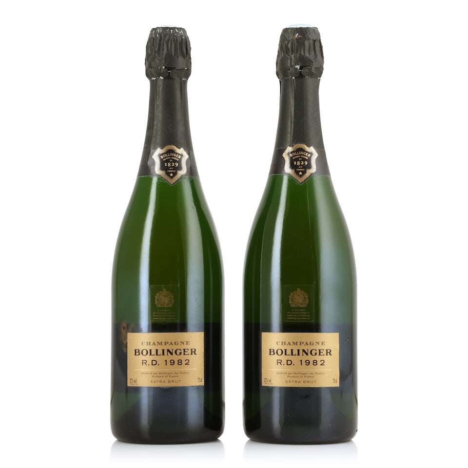 Bollinger, R.D., 1982 (2 x 750ml): Bollinger, R.D., 1982 (2 x 750ml) Region: Champagne Capsule: worn foils Label: lightly bin-soiled & damp-affected Packaging: individual wooden presentation cases Notes: disgorged 5 November 1998 For f