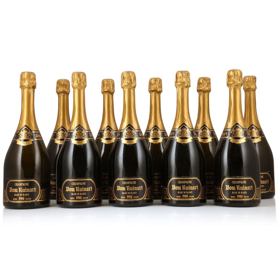 Dom Ruinart, Blanc de Blancs, 1988 (10 x 750ml): Dom Ruinart, Blanc de Blancs, 1988 (10 x 750ml) Region: Champagne Label: 1 nicked Packaging: damp-affected individual presentation cases in two damp-affected original cartons For further information o