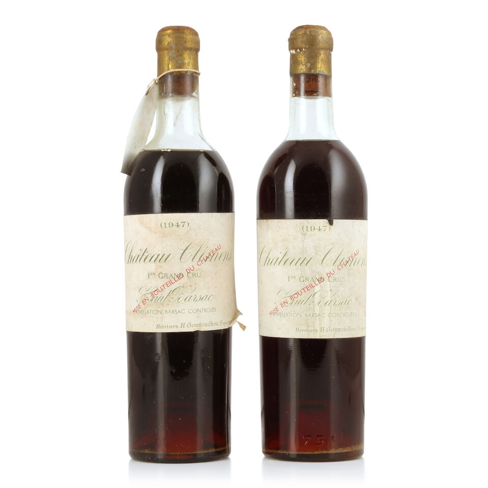 Château Climens, 1947 (2 x 750ml): Château Climens, 1947 (2 x 750ml) Region: Sauternes Fill Level: 1 top shoulder, 1 high-mid Capsule: corroded, 1 nicked Label: bin-soiled, damp-affected & nicked, 1 peeling For further information