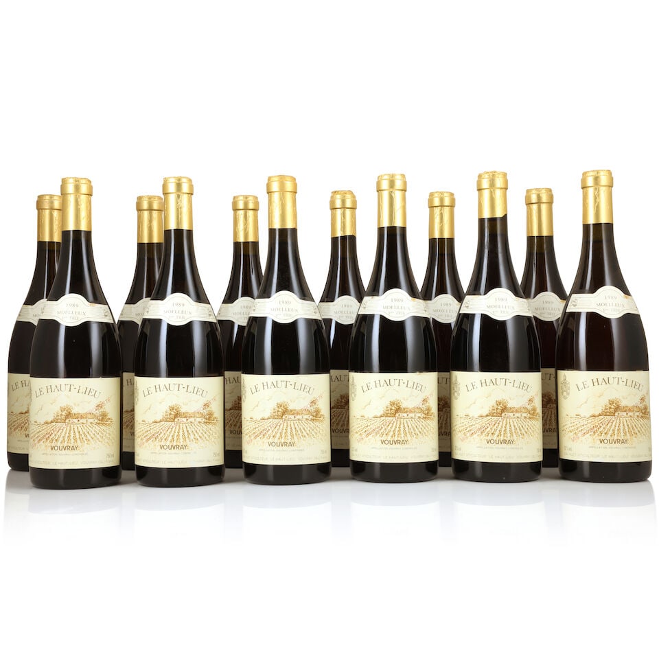 Huet, Vouvray Le Haut Lieu Moelleux Première Trie, 1989 (12 x 750ml): Huet, Vouvray Le Haut Lieu Moelleux Première Trie, 1989 (12 x 750ml) Region: Loire Capsule: 2 slightly corroded Label: lightly bin-soiled & damp-affected; vintage labels are stained & slightly pe
