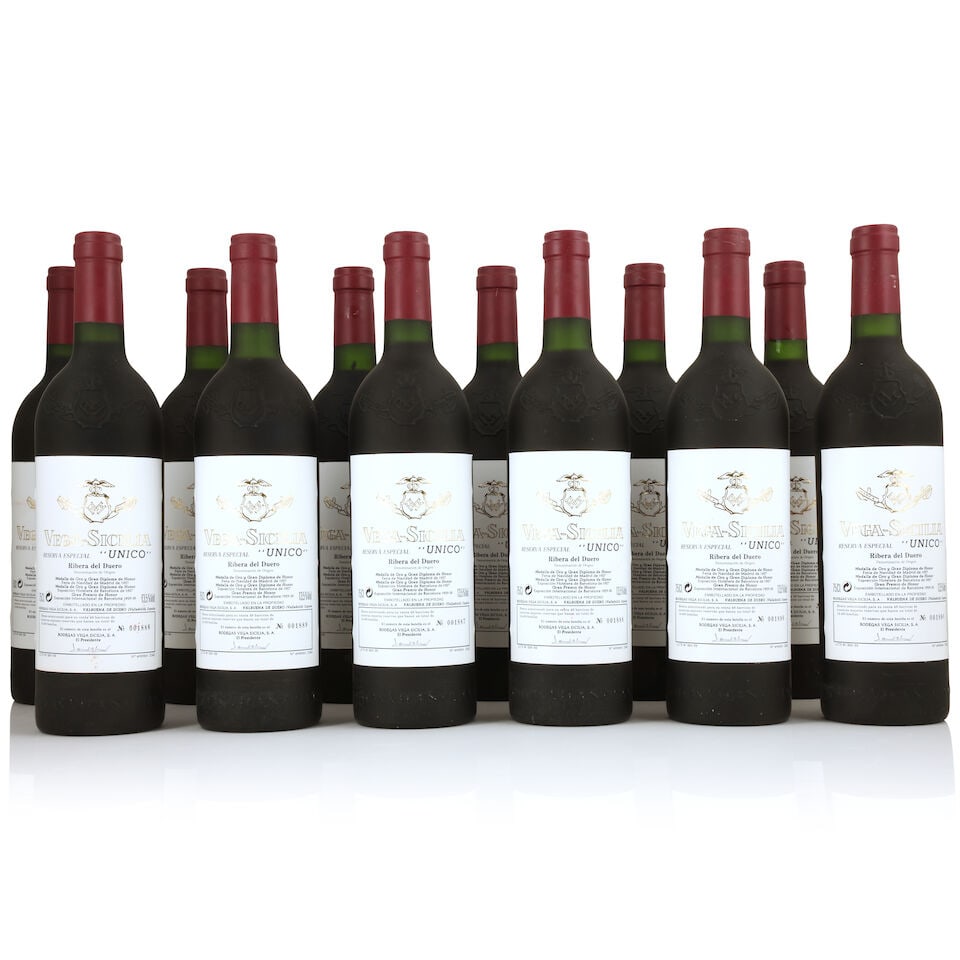 Vega Sicilia, Reserva Especial Unico, NV (12 x 750ml): Vega Sicilia, Reserva Especial Unico, NV (12 x 750ml) Region: Spain Fill Level: 3 very top shoulder Capsule: 2 worn by dividers Label: lightly damp-affected & creased Packaging: original wooden case M