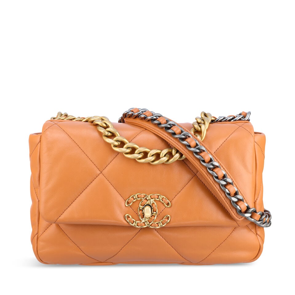 Chanel: an Orange Small 19 Flap Bag (includes microchip): Chanel: an Orange Small 19 Flap Bag Quilted glazed leather with matte gold tone and silver tone hardware Condition Grade B 25cm wide, 17cm high, 8cm deep, 9cm handle drop, 48cm shoulder drop, includes
