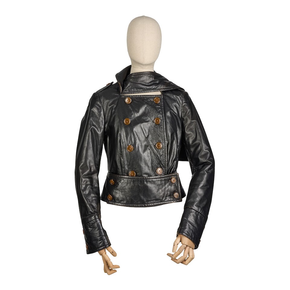 Vivienne Westwood: a Black Leather Biker Jacket Red Label, early 2000s: Vivienne Westwood: a Black Leather Biker Jacket Red Label, early 2000s Creative Director: Vivienne Westwood Distressed black leather with buttoned wrap belt detail to waist, double breasted with horn 