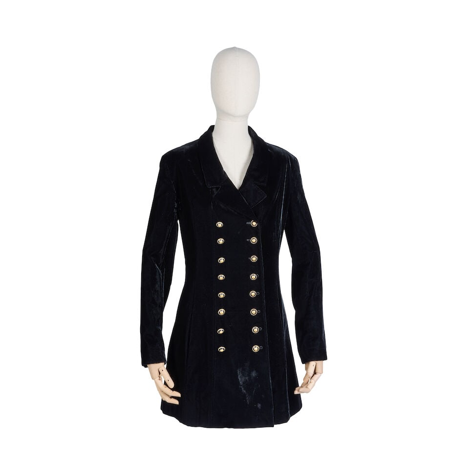 Chanel: a Black Velvet Jacket Autumn 1993: Chanel: a Black Velvet Jacket Autumn 1993 Creative Director: Karl Lagerfeld Black velvet long jacket with double breasted gilt and black CC buttons, flaring from the waist at the back Condition Grade 