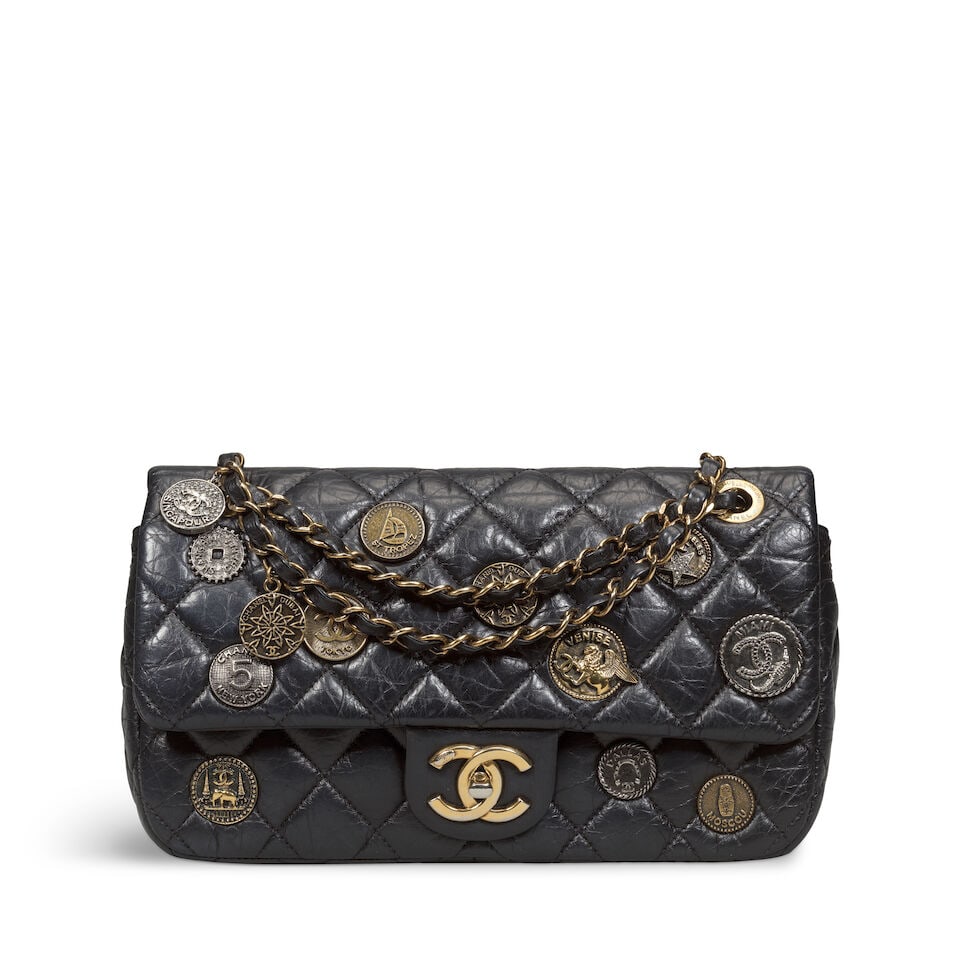 Chanel: an Aged Calfskin Coin Medallion Charm Medium Flap Bag Paris-Dubai Collection, Cruise 201...: Chanel: an Aged Calfskin Coin Medallion Charm Medium Flap Bag Paris-Dubai Collection, Cruise 2015 Quilted calfskin with aged gold tone hardware, design includes medallion coins in aged silver and gold