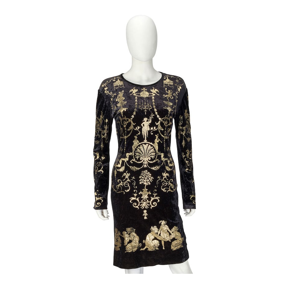Vivienne Westwood: a 'Boulle' Stencilled Black Velvet Dress 'Portrait' Collection, Autumn/Winter...: Vivienne Westwood: a 'Boulle' Stencilled Black Velvet Dress 'Portrait' Collection, Autumn/Winter 1990-91 Red on white label, mid-length with long sleeves, the velvet stencilled with gold foil rococo m