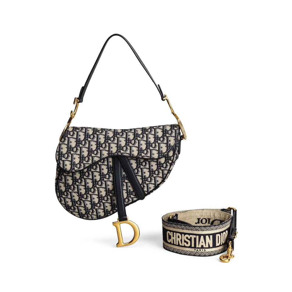 Christian Dior: a Blue Oblique Jacquard Medium Saddle Bag 2018 (includes box): Christian Dior: a Blue Oblique Jacquard Medium Saddle Bag 2018 Gold tone hardware Condition Grade B 26cm wide, 20cm high, 6cm deep, 20cm handle drop, 41-49cm shoulder drop, includes box For further in