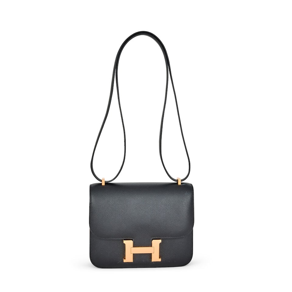 Hermès: a Black Epsom Leather Constance 18 2022 (includes protective felt, dust bag and cop... (1 of 2)