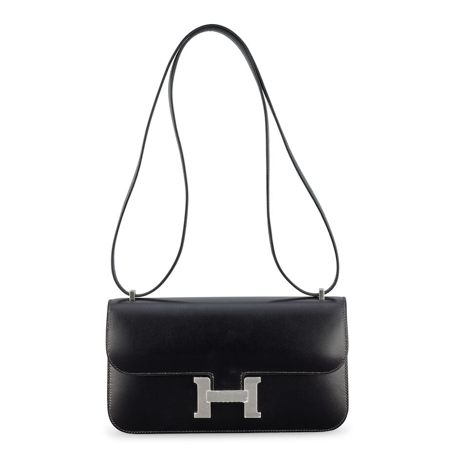 Hermès: a Black Box Leather Constance Elan 2024 (includes mirror, felt protector, booklet, ... (1 of 2)